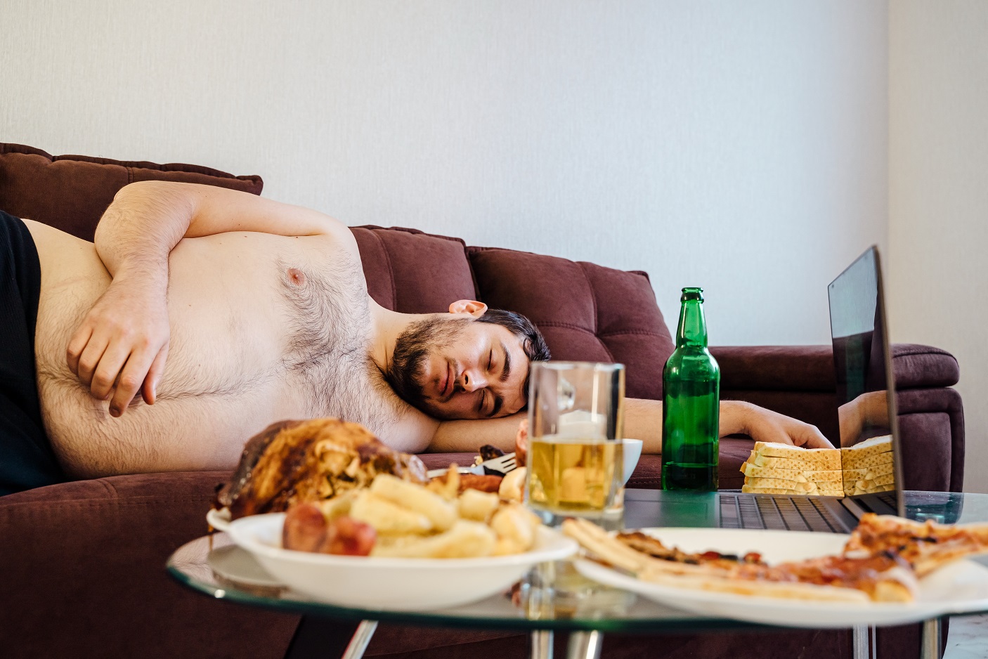 drunk obese young man sleeping