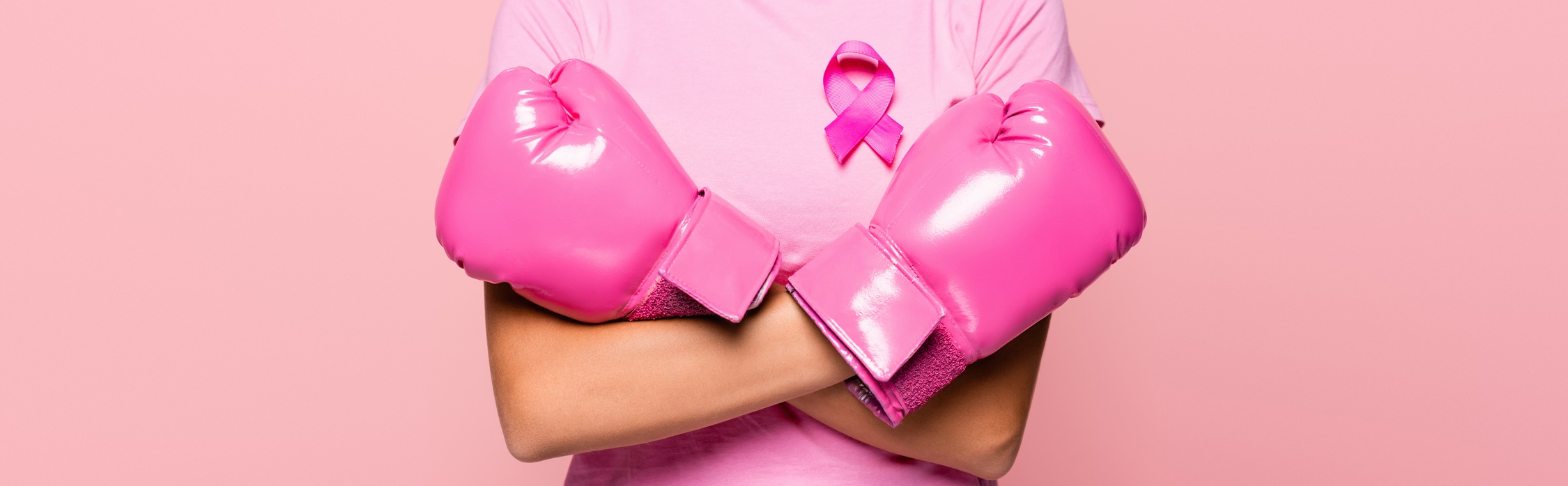 pink boxing gloves symbolize fighting breast cance 2026