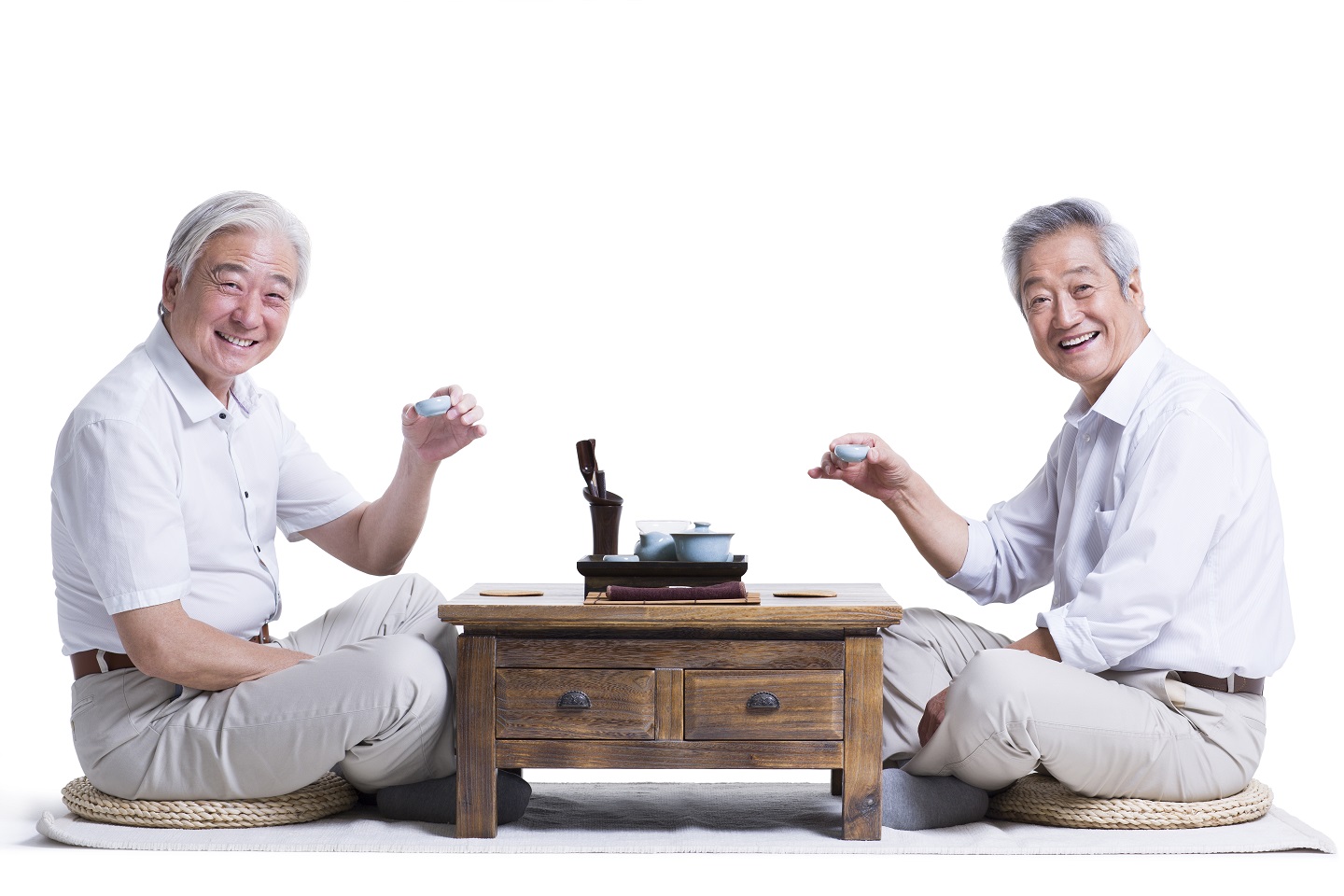 male senior friends having tea