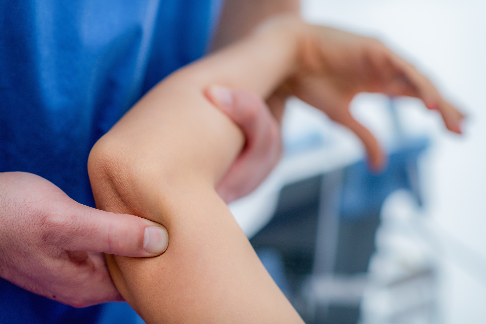 adult arm receiving examination in medical setting 2026