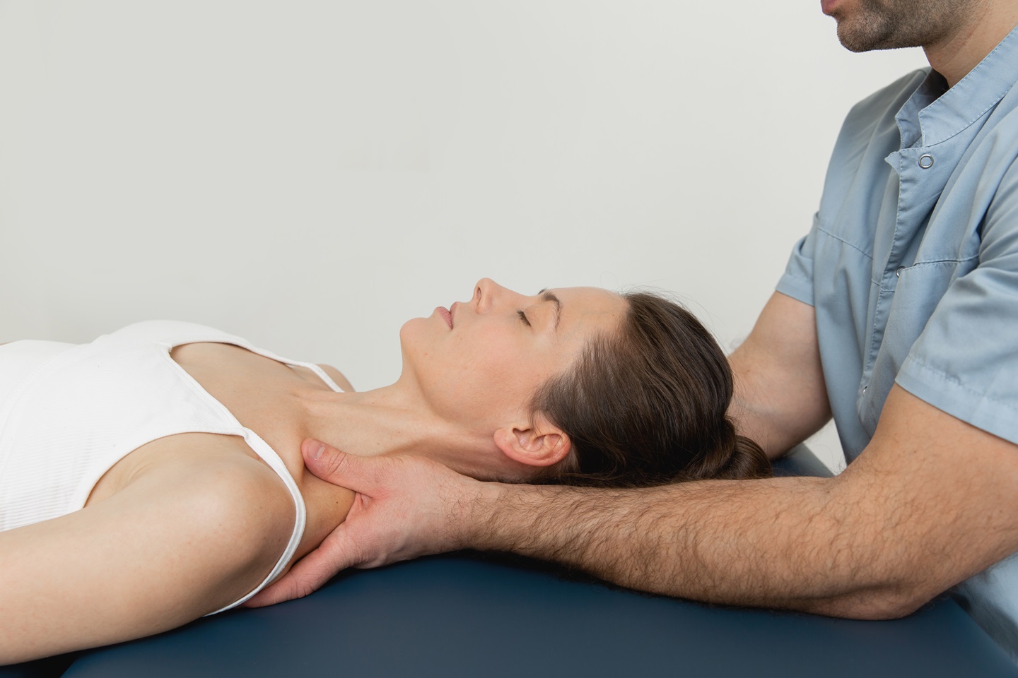 side view doctor examining patient