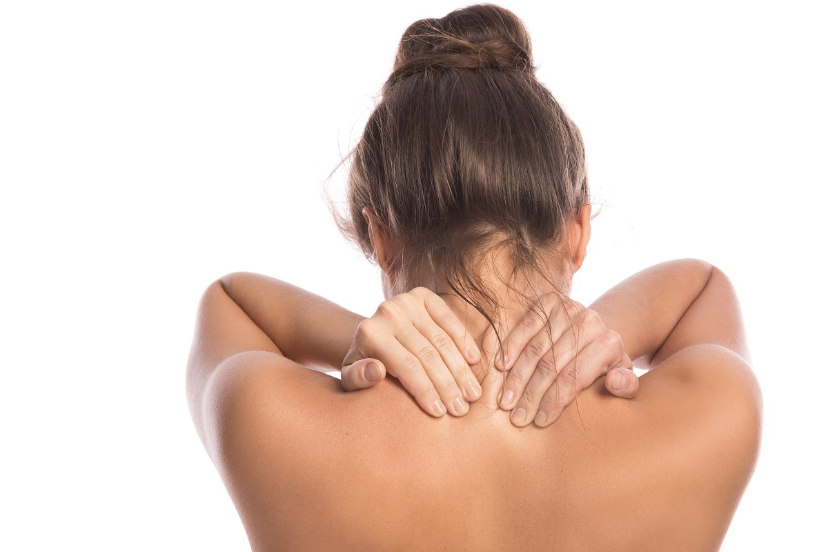 woman with pain in her back and neck 