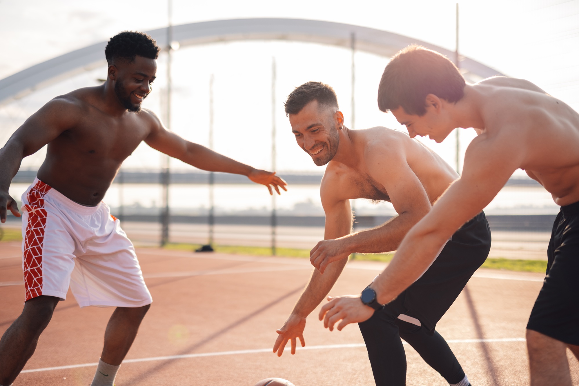 men enjoying a basketball game on a court 2026