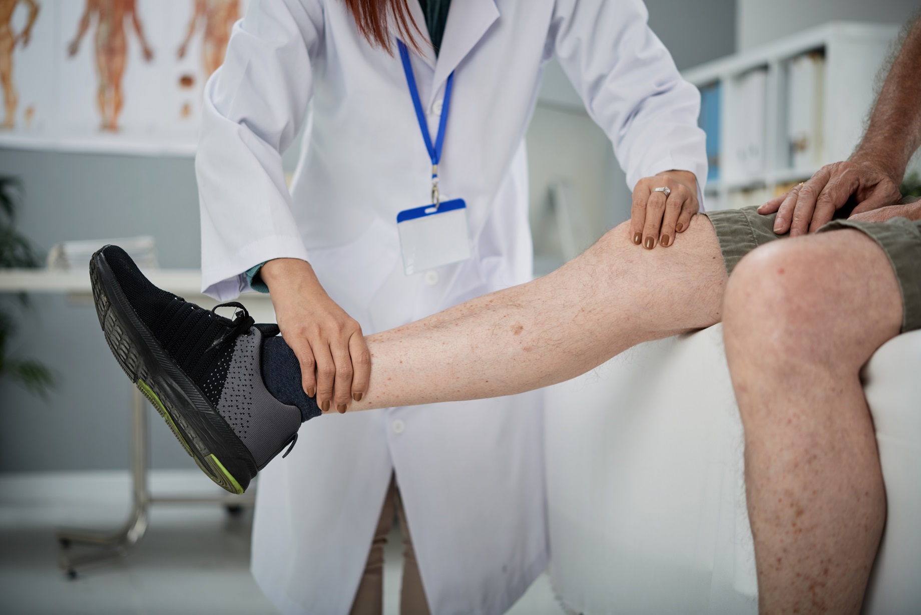 physiotherapist palpating