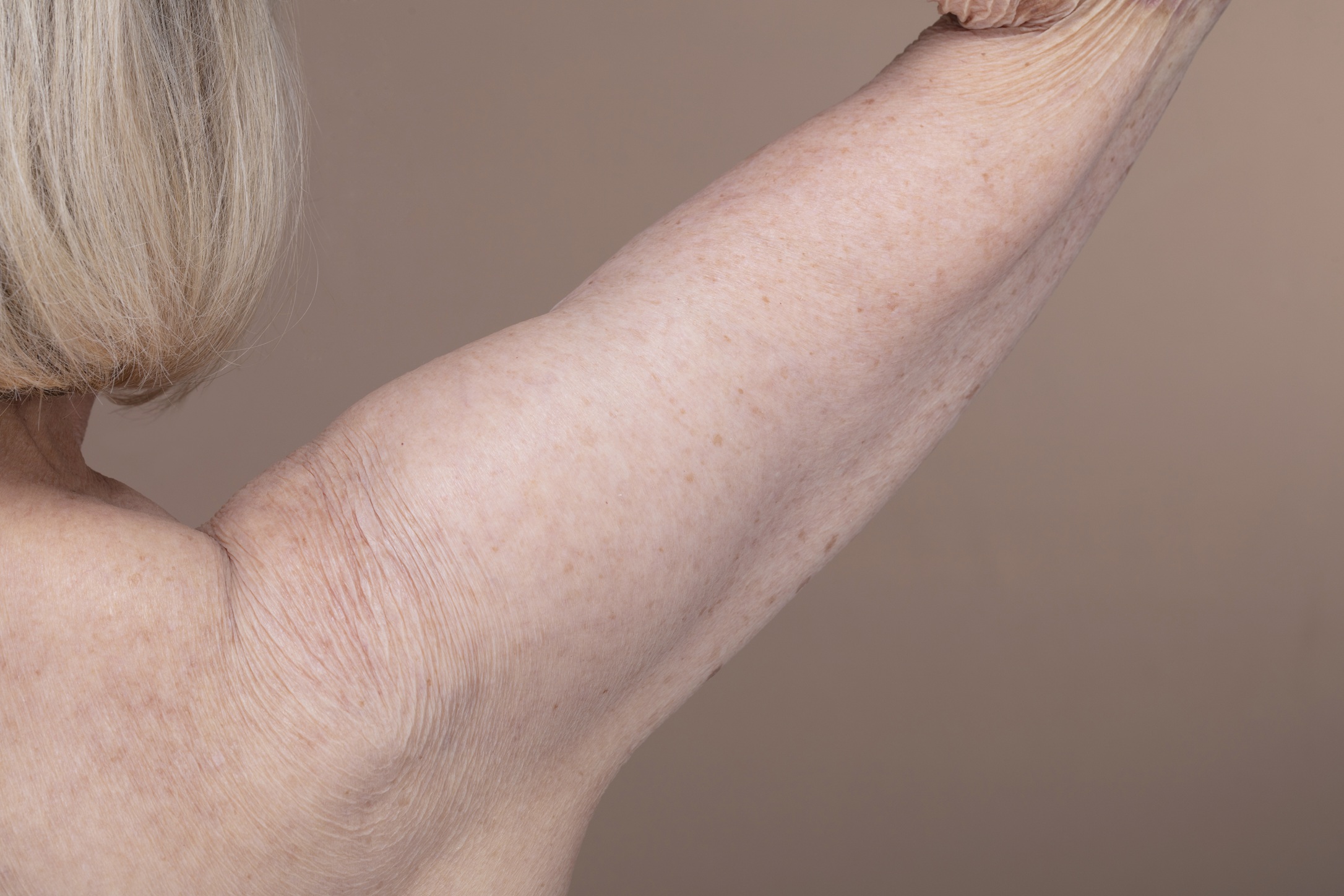 close up of senior woman s bare shoulder 2026