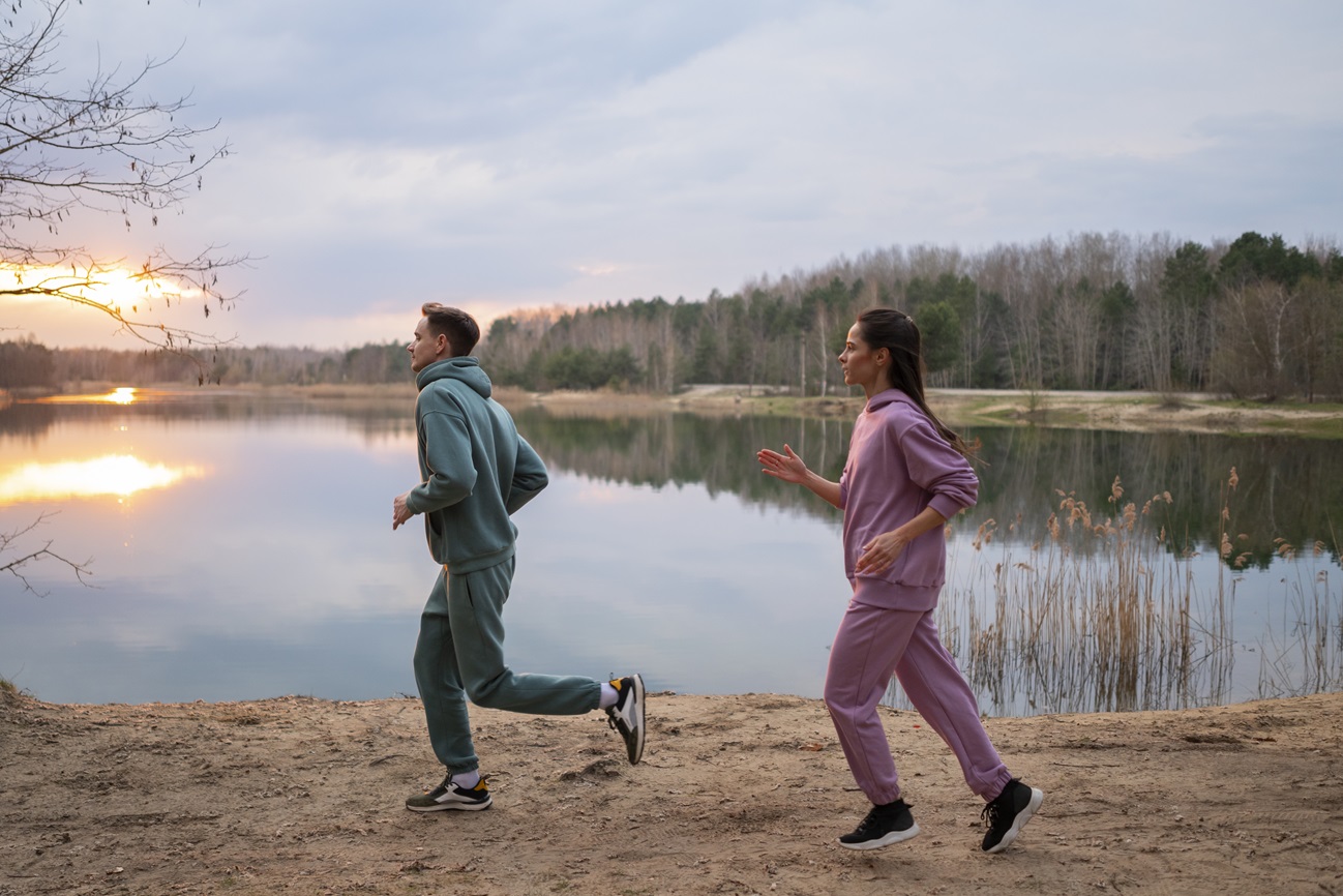 full shot couple running