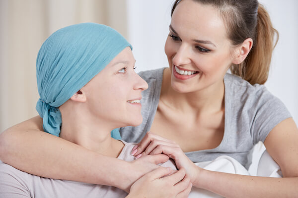 bigstock-Hopeful-Cancer-Woman-With-Frie-166612097