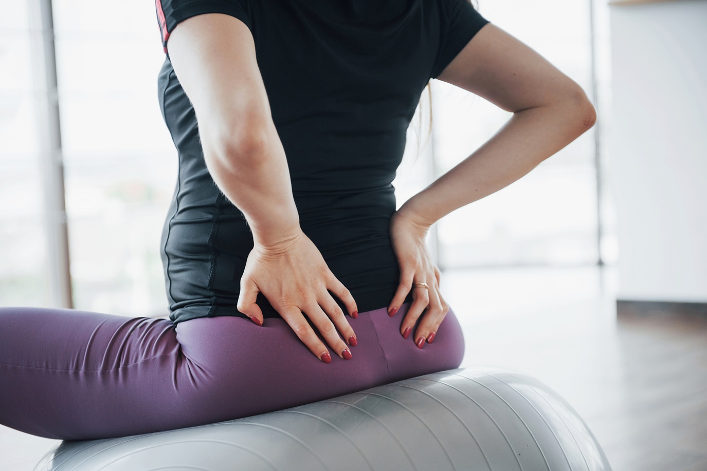 women sitting ball exercises gym