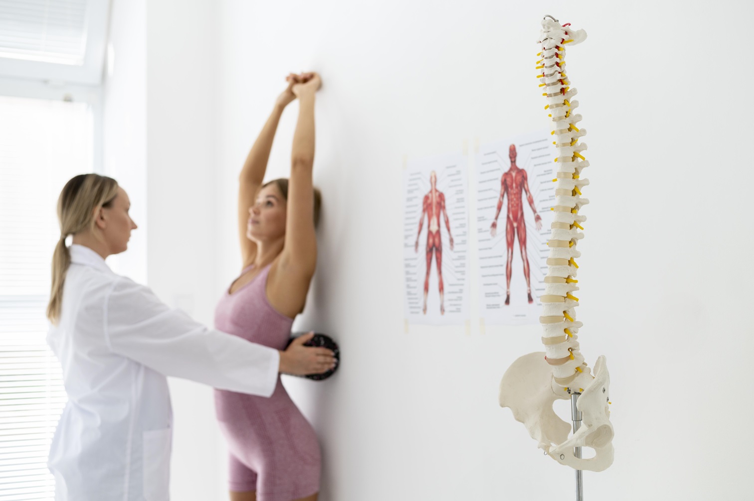young woman with back problems doing physiotherapy