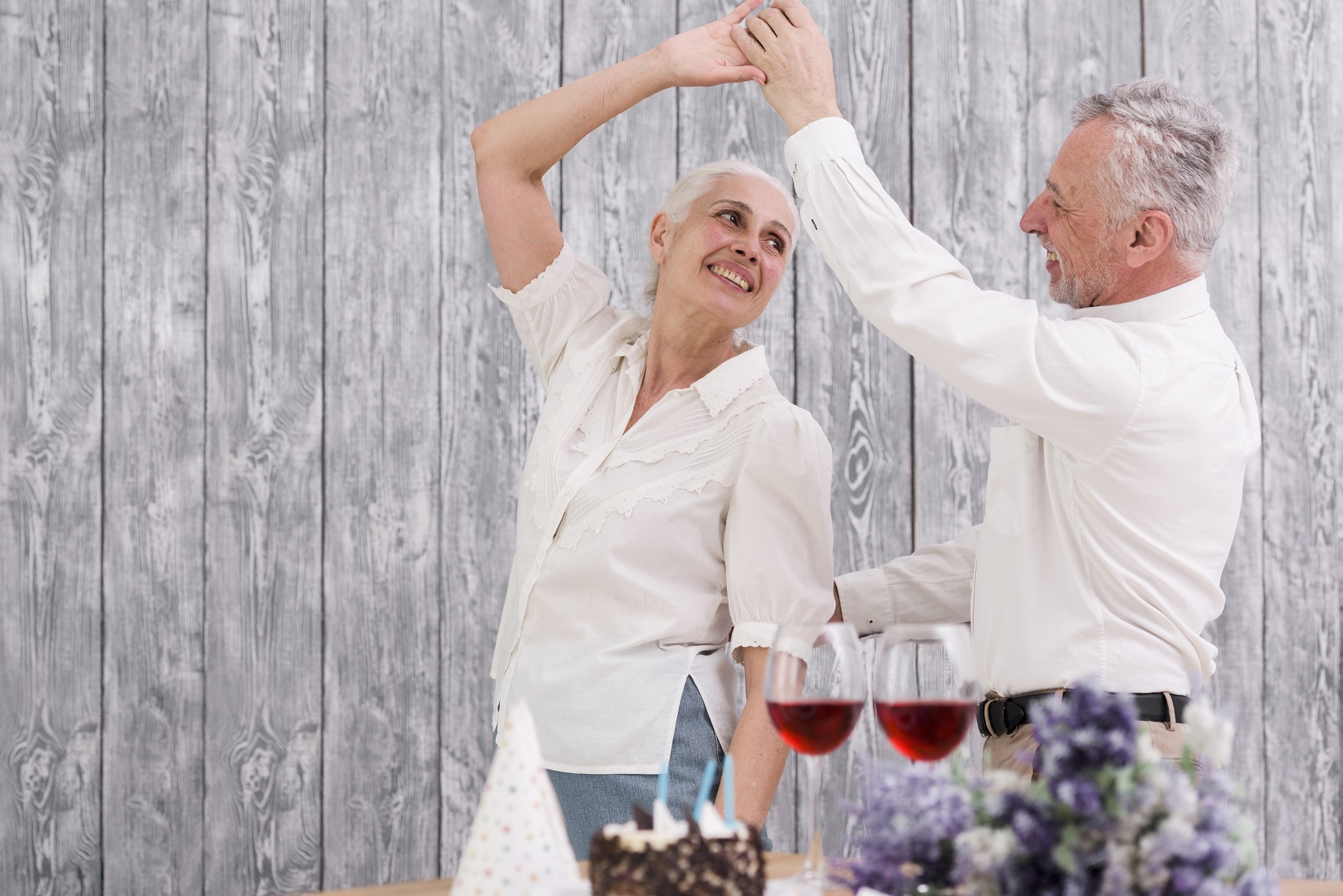 happy senior couple dancing